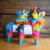 The perfect party favor or gift, these tabletop piñatas are sure to bring a smile to your face! Each piñata contains 6 random prizes tat may include: vintage inspired toy, riddle, sweets, gem, fortune, temporary tattoo, quote, or more. 